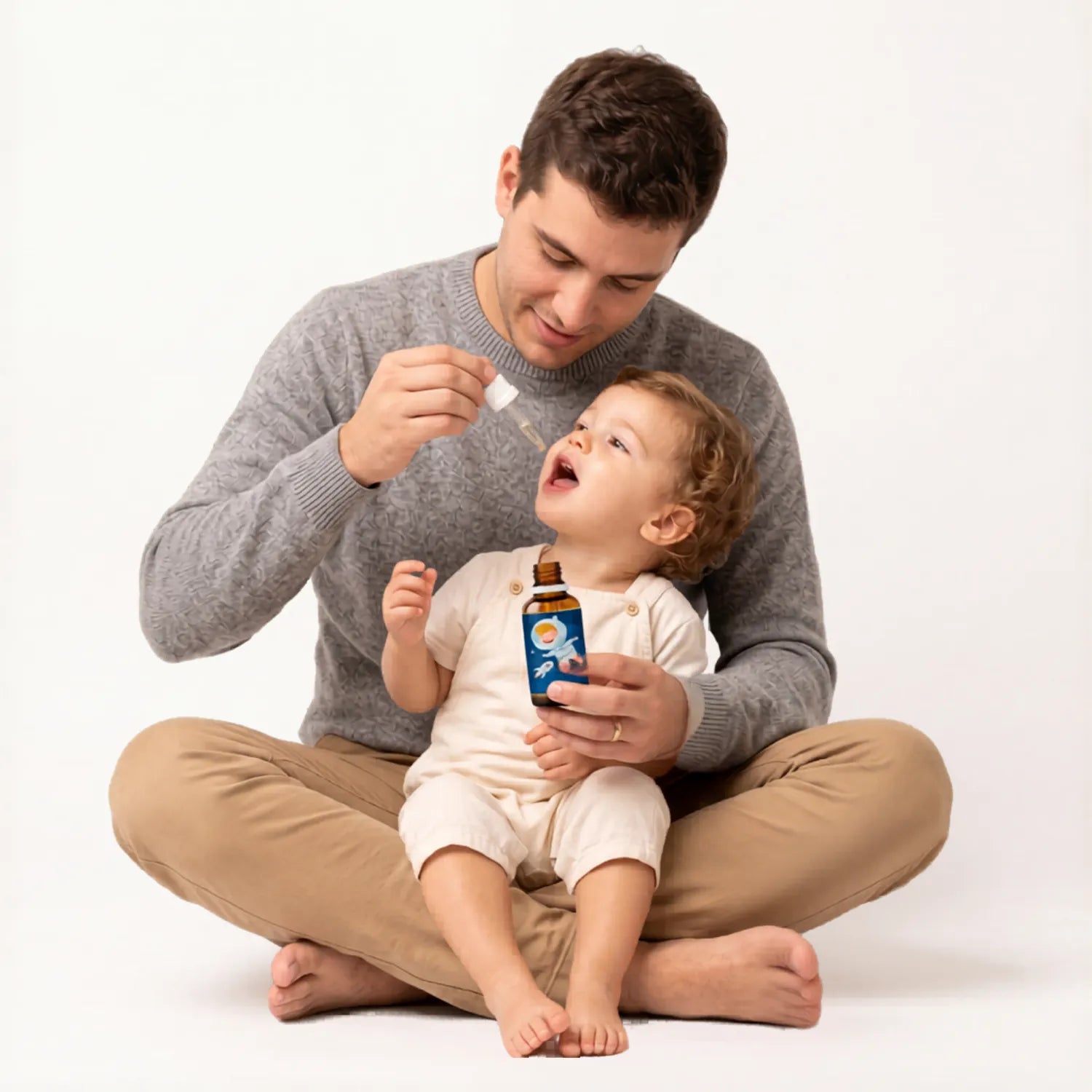 Ferrix Ferro Infantil – Pai administrando o conta-gotas para o bebê